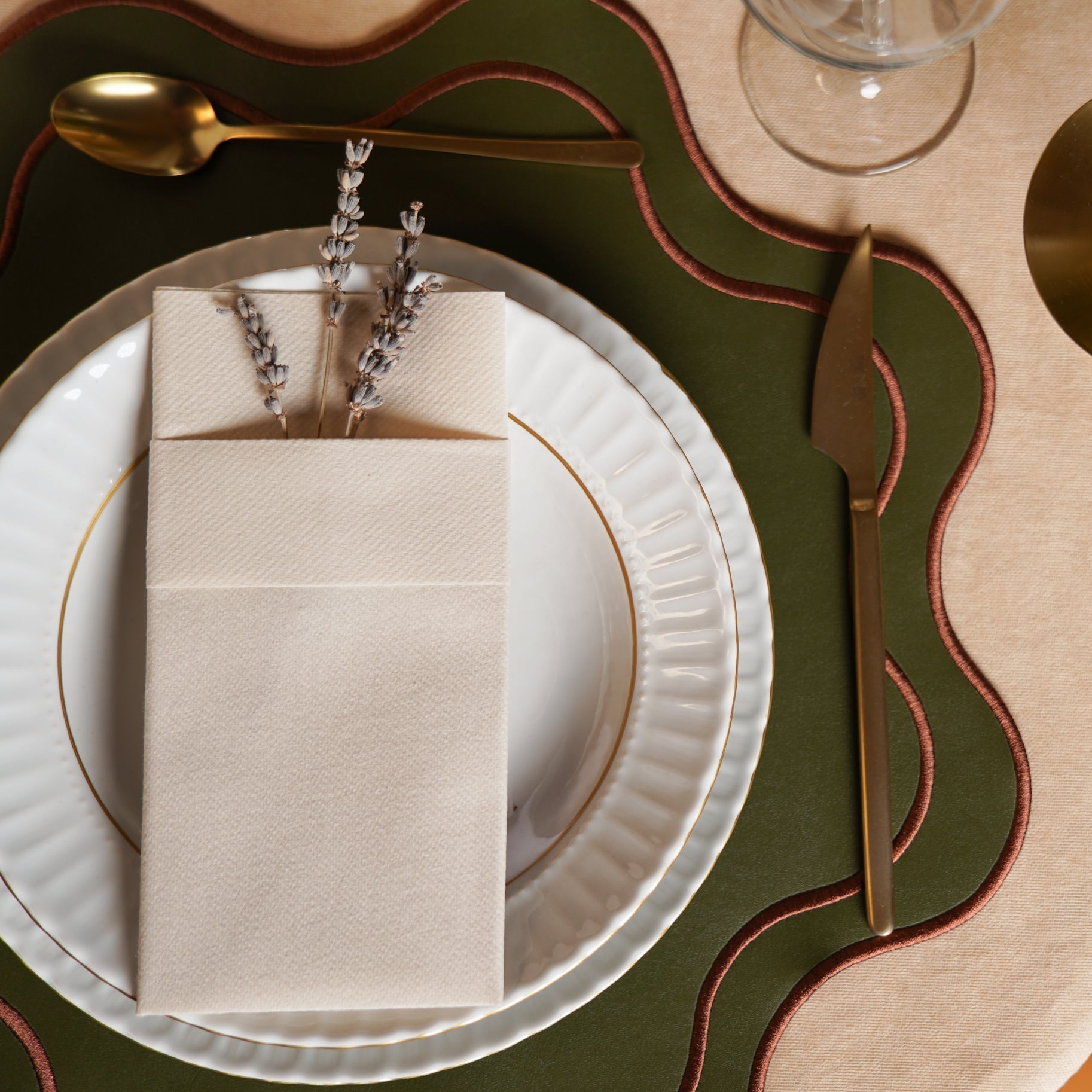 HAVEN DARK GREEN BROWN TRIM WAVY EDGE FAUX LEATHER PLACEMAT - mosswell.us