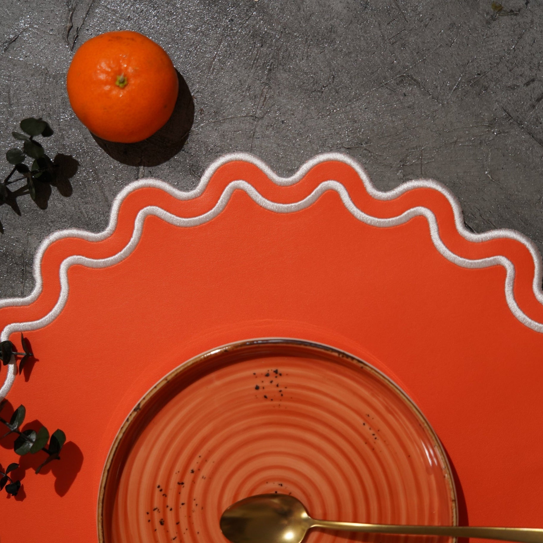 SOLACE ORANGE & WHITE SCALLOPED FAUX LEATHER PLACEMAT - mosswell.us